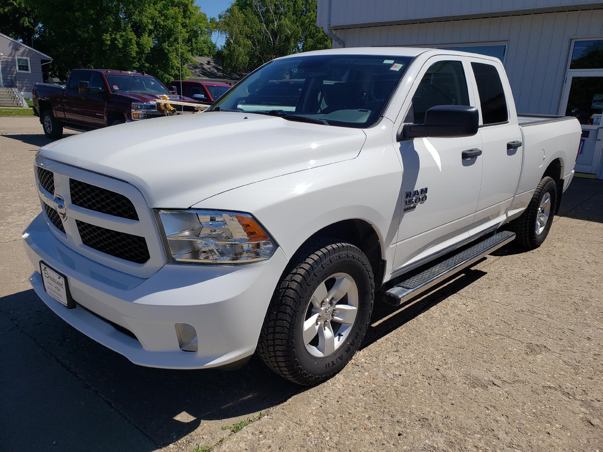 2019 RAM 1500 Classic Express 4x4 Quad Cab 6'4" Box in White — front three-quarter view